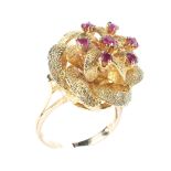 A ladies 9ct gold dress ring, in form of a stylised flower, set with seven stones, ring size P,