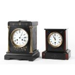 Two late 19th century slate mantel clocks, each with white enamelled dials and black Roman numerals,