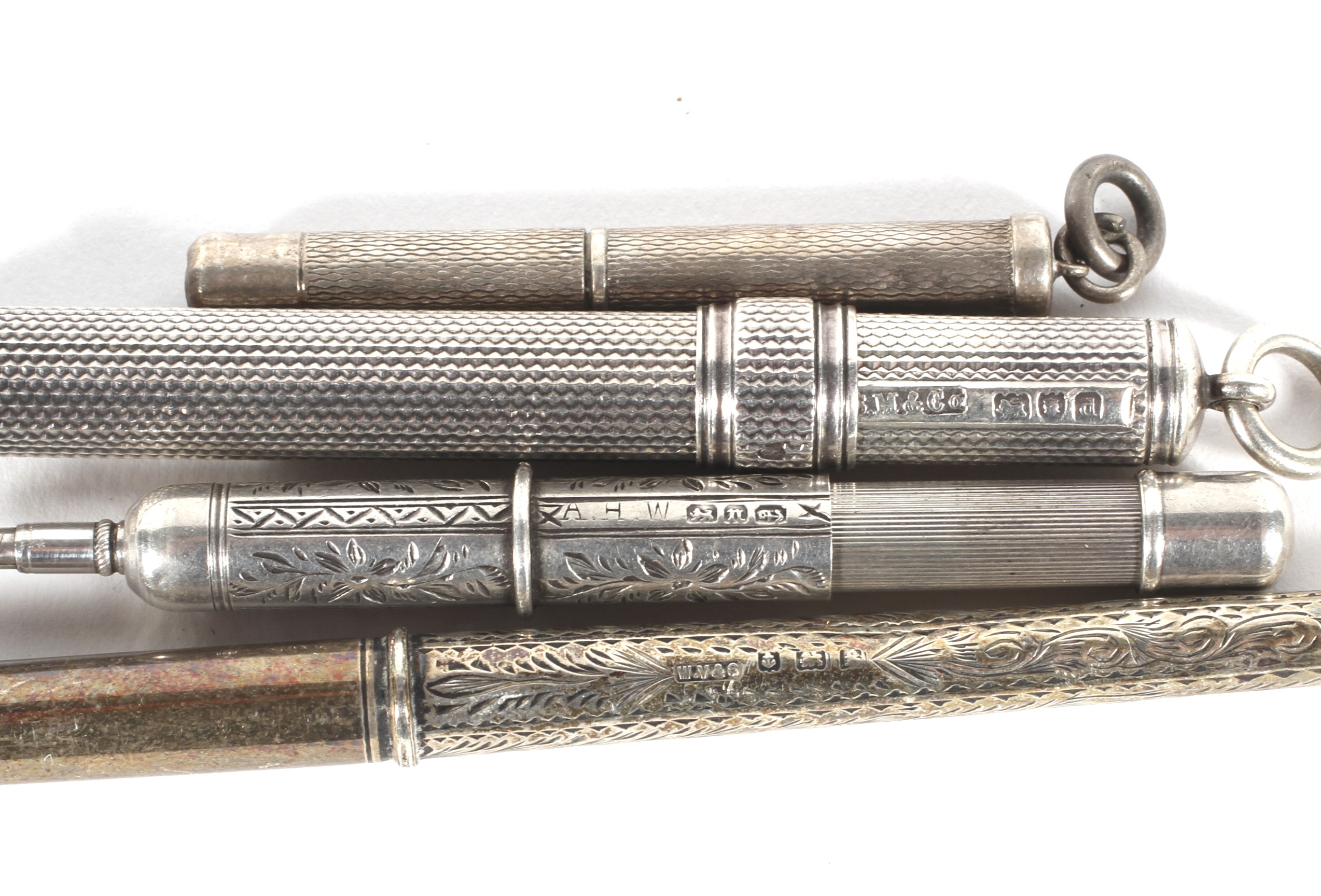 A collection of silver, white and gilt metal propelling pencils, late 19th - early 20th century, - Image 2 of 2