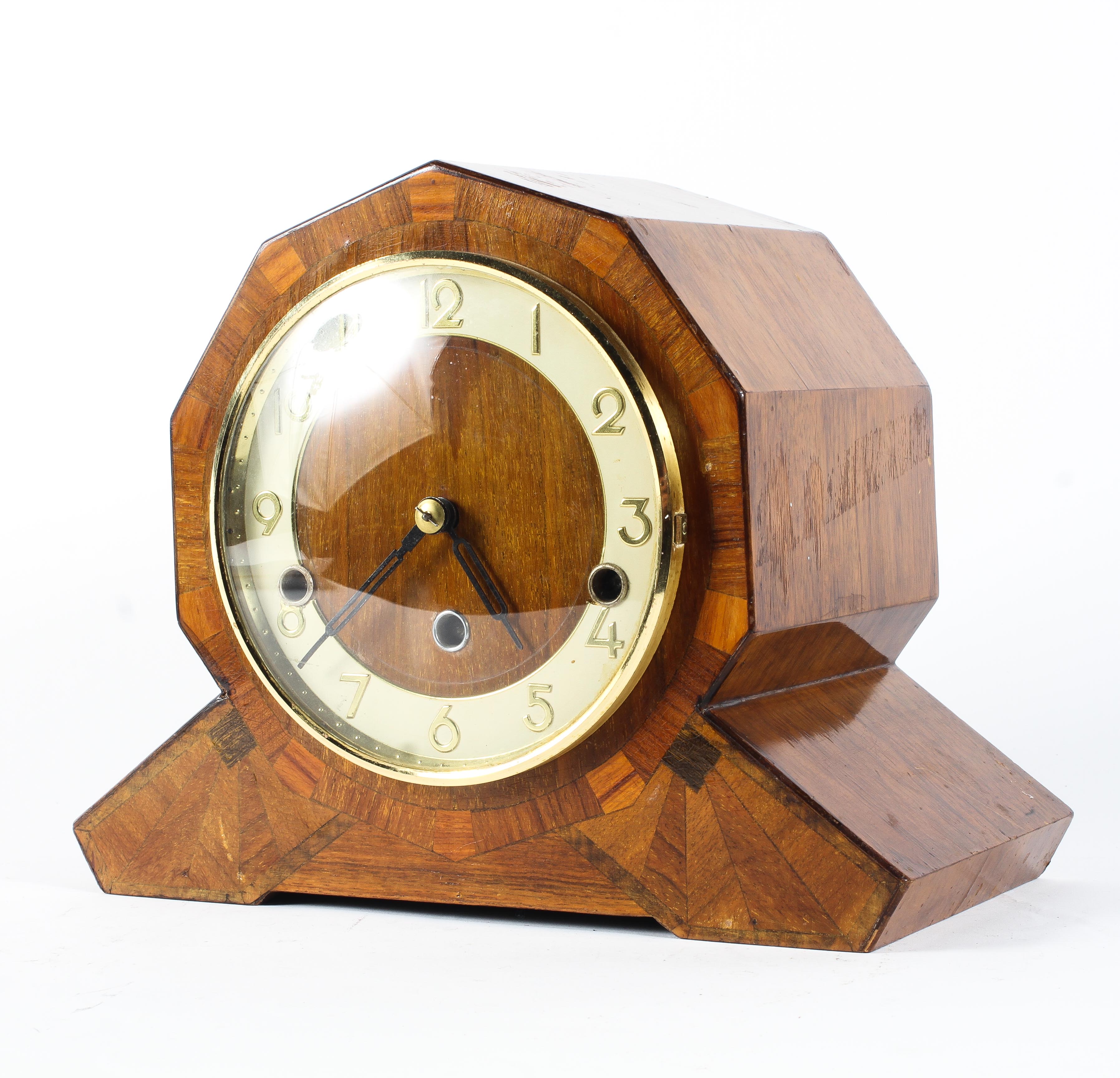 A Continental Art Deco Westminster chimes walnut veneered mantel clock,