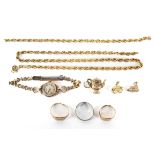 An assortment of 9ct gold including necklaces, rings, charms a ladies watch etc