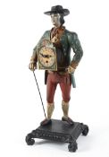 An unusual 20th century painted metal figure depicting a gentleman in period dress,