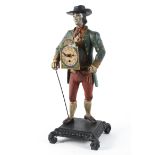 An unusual 20th century painted metal figure depicting a gentleman in period dress,