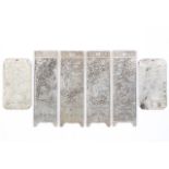 A collection of six Chinese white metal ingot plaques,