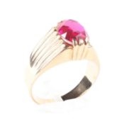 A gentleman's gold ring, stamped 583 set with a Burma ruby,