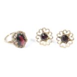 A pair of 9ct gold garnet set daisy earrings and a Victorian style garnet set dress ring,