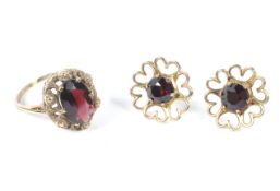 A pair of 9ct gold garnet set daisy earrings and a Victorian style garnet set dress ring,