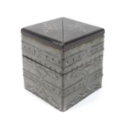 A late 19th century pewter and lacquer topped box,