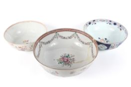 Three large Chinese porcelain punch bowls, 18th century,