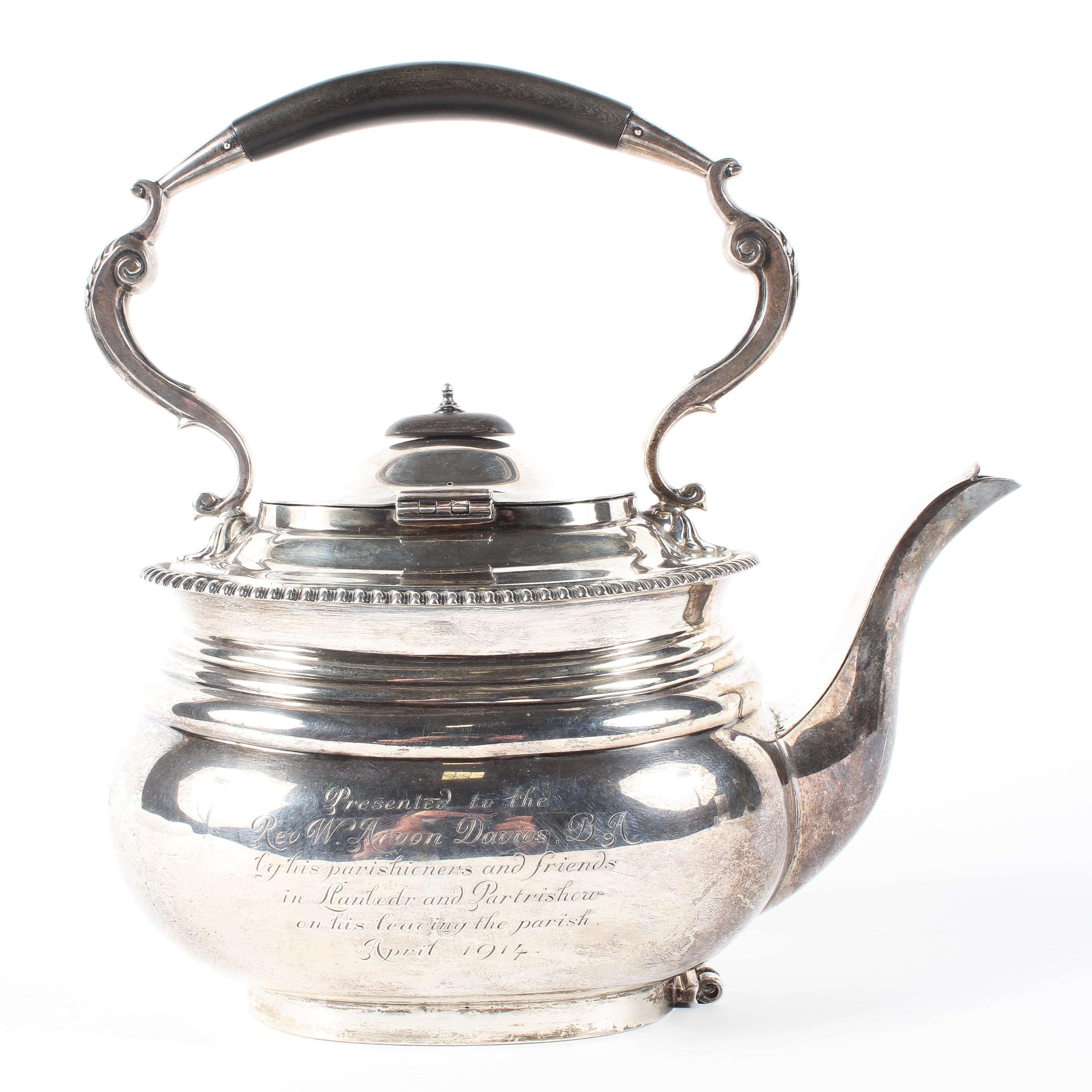 A silver tea pot, with gadrooned decoration and ebony handle and finial, - Image 2 of 3