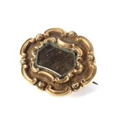 A Victorian Yellow metal mourning brooch, with inscription to the verso dated 1839