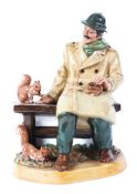 A Royal Doulton figure of a gentleman feeding squirrels on a bench, titled 'Lunchtime',