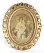 A 19th century giltwood oval picture frame and a sepia print of a portrait of a lady