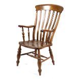 A 19th century beech and elm Grandad Windsor armchair,