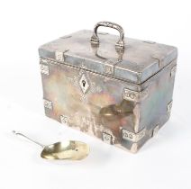 A fine Russian silver tea caddy in the form of a metal trunk with swing carrying handle,