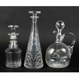 Three assorted glass decanters,