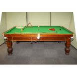 A Burroughes & Watts mahogany snooker table, early 20th century, bearing ivorine plaque,