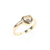 An 18ct gold floating diamond ring, ring size I,