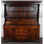 A fine late 18th century closed oak dresser,