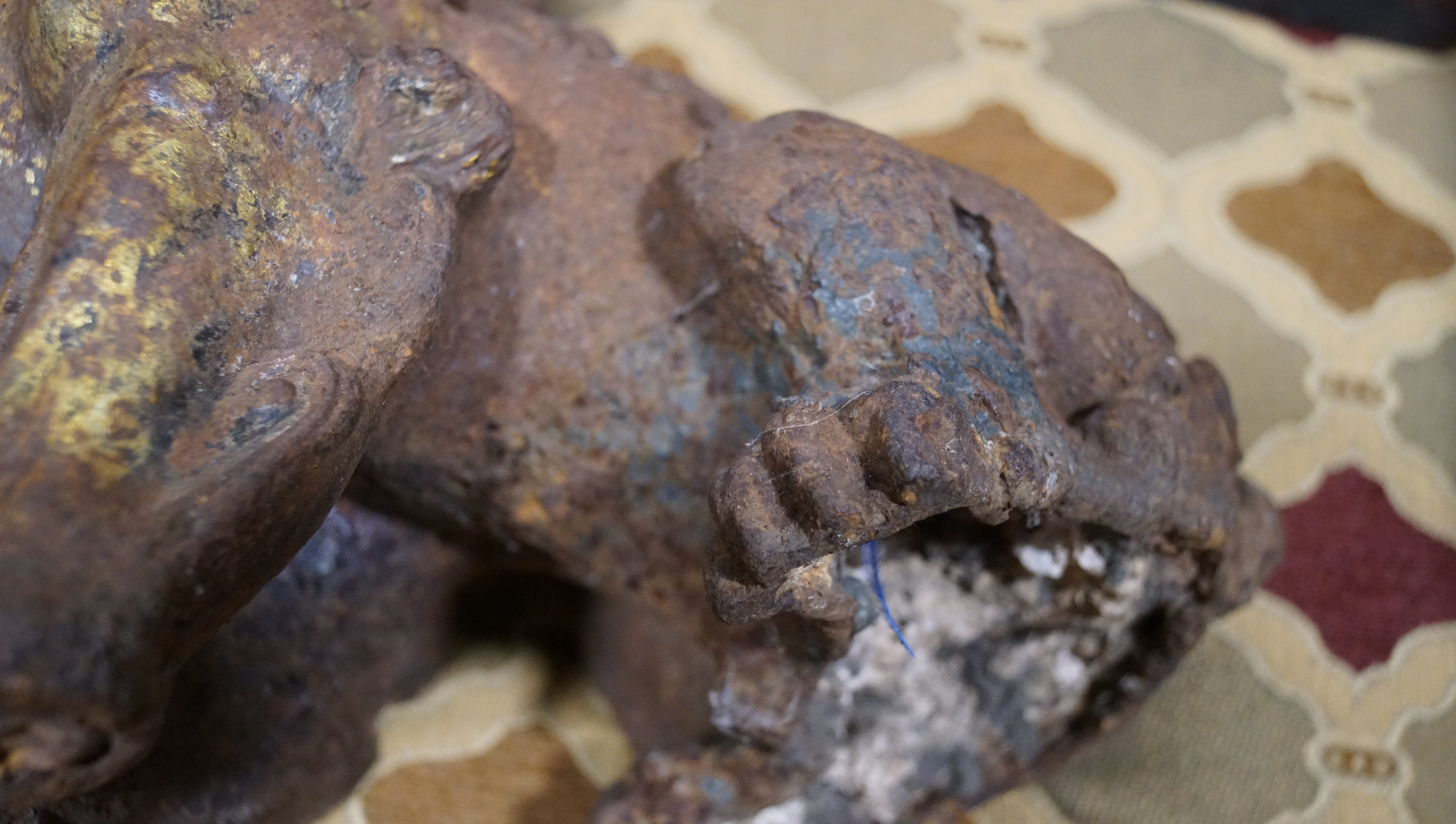 A pair of Chinese cast iron lions, each modelled seated with front paw on a brocaded ball, - Image 12 of 15