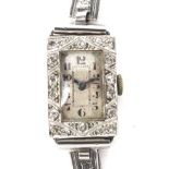 A white metal ladies cocktail watch, the case stamped 'Full Platinum',