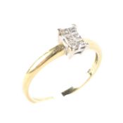 An 18ct gold diamond ring, set with six square cut diamonds giving an illusion of a solitaire ring,