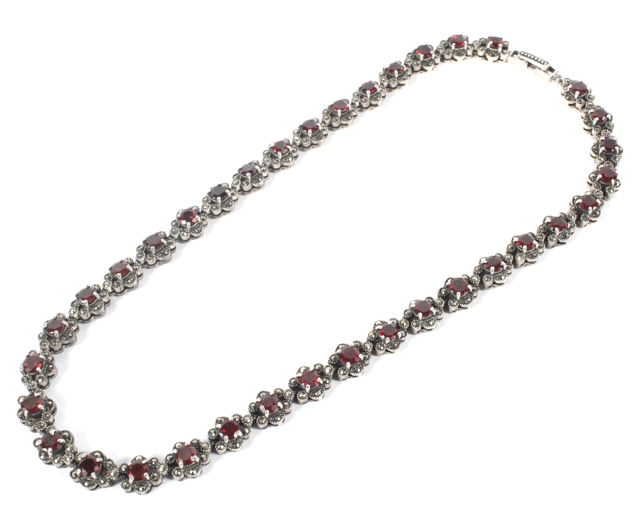 A Continental white metal floral necklace