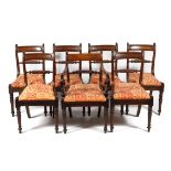 Seven mid-19th century mahogany dining chairs, with bar backs and spirally carved backs,