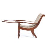 A 1890's childs 'plantation' chair of unusual form the body woven in straw of intricate design,