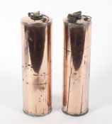 Two copper cylindrical water flasks or warmers, with loop brass handles and screw tops,