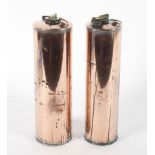 Two copper cylindrical water flasks or warmers, with loop brass handles and screw tops,