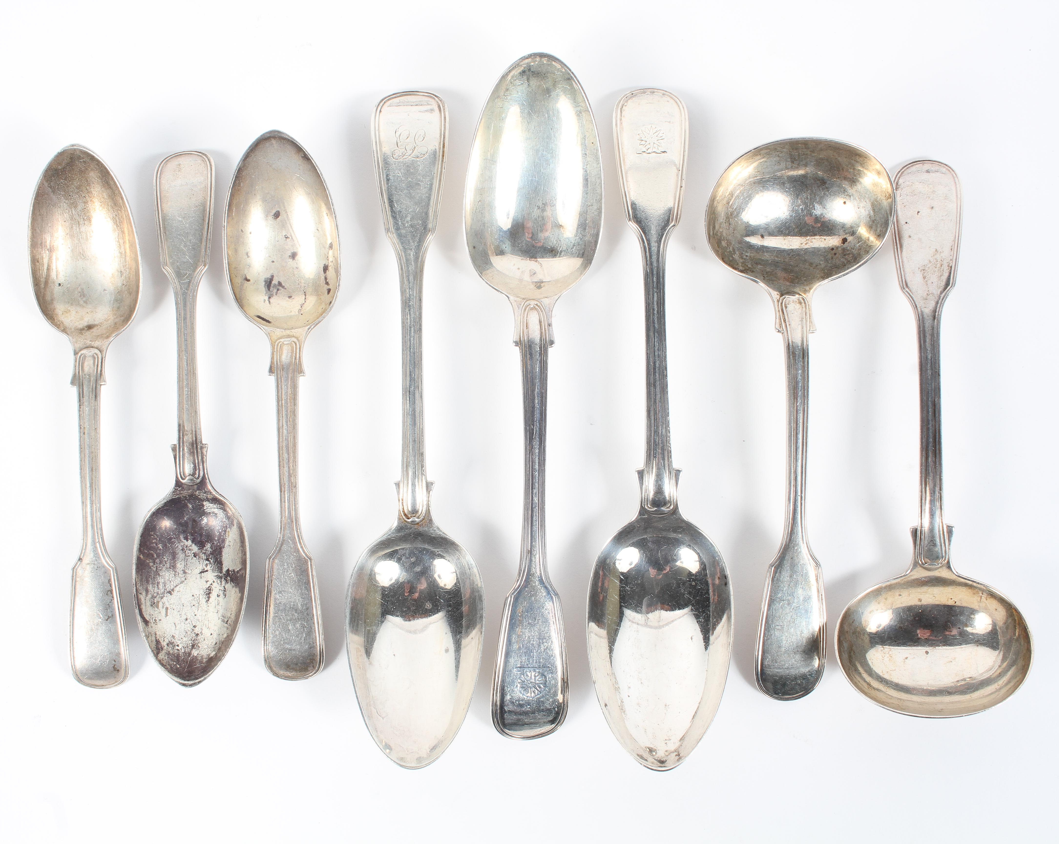 An assortment of Georgian and Victorian silver spoons, including serving...