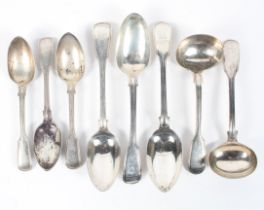 An assortment of Georgian and Victorian silver spoons, including serving, ladles and dessert spoons,