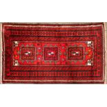 An Eastern Gonbad wool rug,