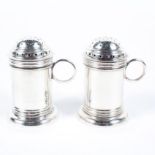 Two silver powder shakers with ring handles, maker Thomas Bradbury & Sons Ltd, Sheffield, 1925,