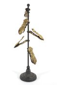 A steel and brass letter tree, with five gilt metal hand-shaped clips,