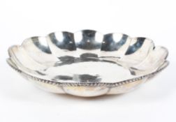 A Georgian silver fluted bowl, with beaded rim, 29.8cm diam.