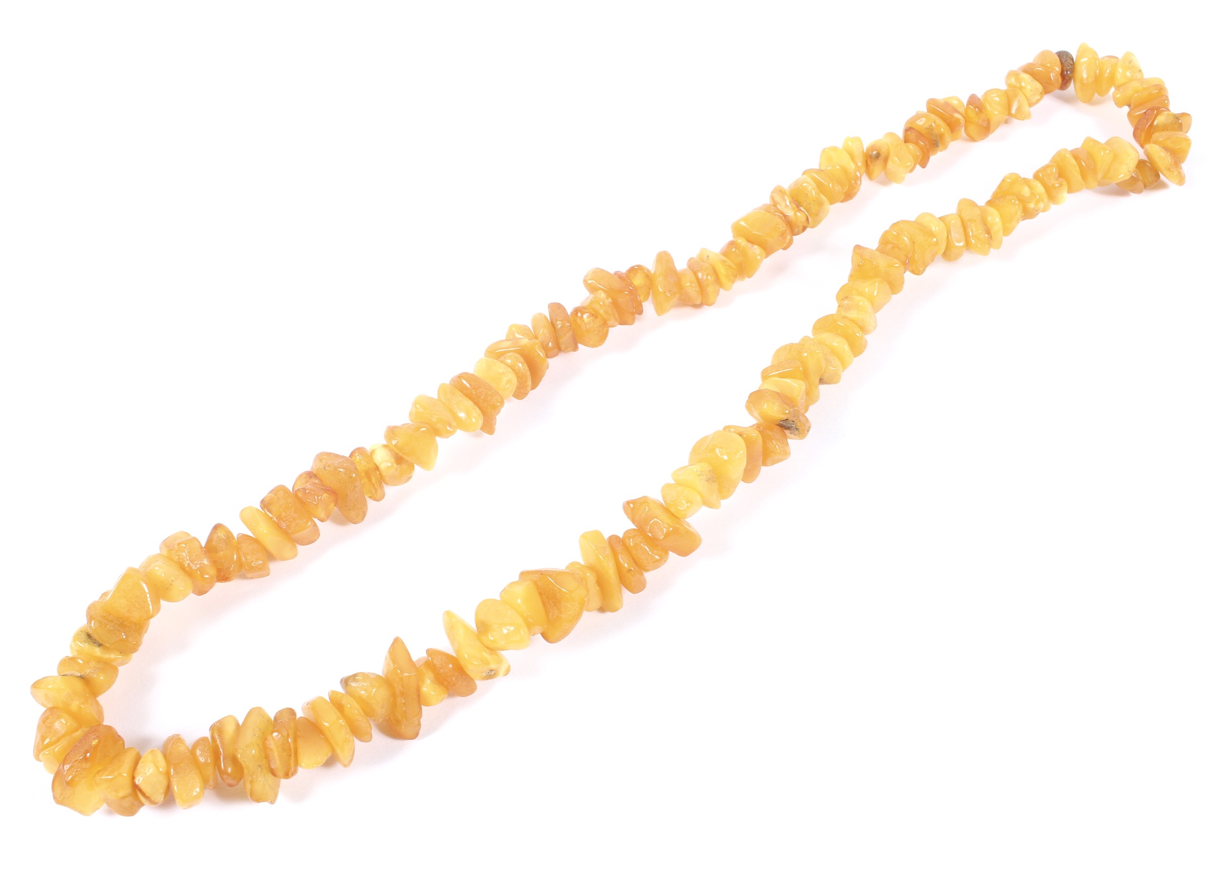 An amber rough cut beaded necklace drop approx 31cm