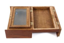 An early 20th century cigar humidor, with hinged flap front and glazed fitted interior, with key,