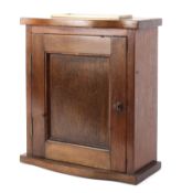 An early 20th century oak letter box, of rectangular form,