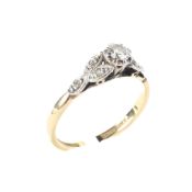 An 18ct gold and platinum set diamond solitare ring,