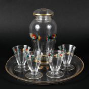 An early to mid 20th century enamelled glass cocktail set, decorated with cock fighting scenes,