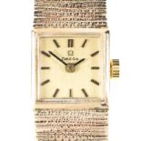 A vintage 9ct gold ladies Omega cocktail wristwatch, with original gold strap,