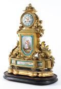 A late 19th century gilt metal and Sevres-style porcelain mounted mantel clock,