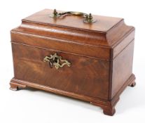 An early 20th Century mahogany three section tea caddy raised on sort shaped bracket feet,