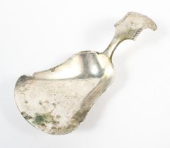 A 19th century Dutch silver caddy spoon, with embossed shell motif to handle,