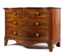 A 19th century serpentine mahogany chest,