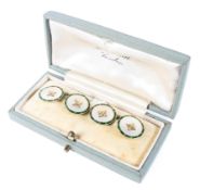 A pair of gents 18ct cufflinks by Gowland Bros Ltd, set with mother of pearl and enamel border,