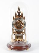 An Elliot (London) brass skeleton clock on stand within glass dome, of Gothic form,