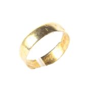 A 22ct gold wedding band, size U,